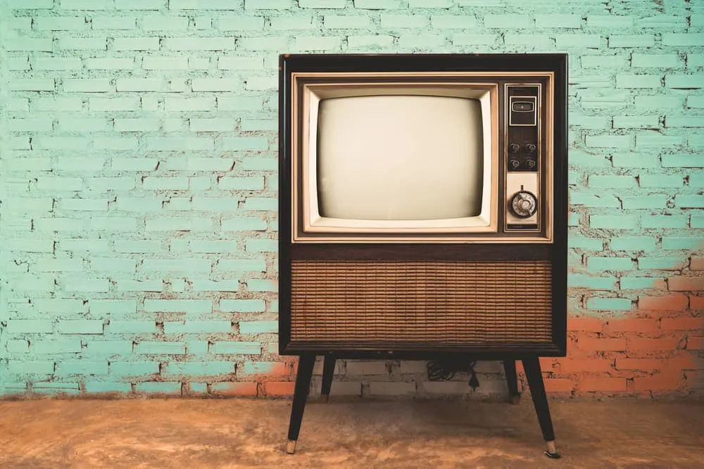 Retro old television in vintage wall twister