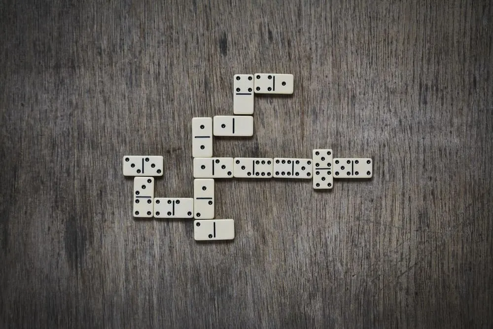 dominoes game on wooden background