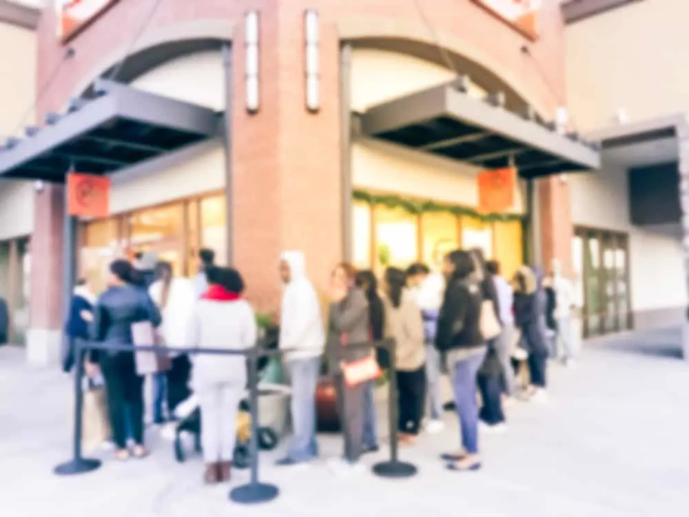 long line of customer waiting at entrance twister