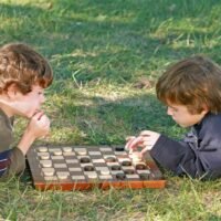 Boys Playing Checkers