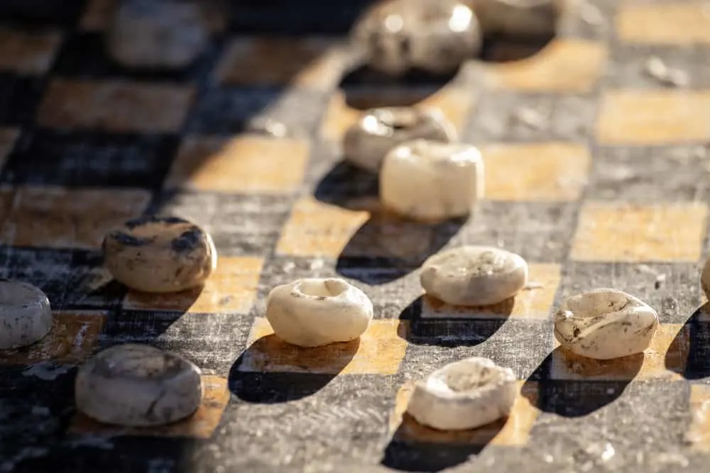 Old rough stone draughts close-up