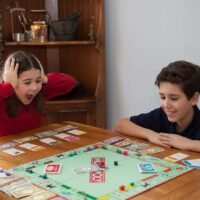 A family playing Monopoly 2