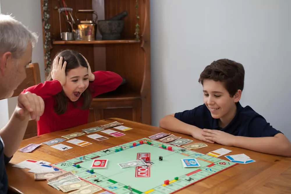 A family playing Monopoly 2