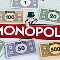 Center of Monopoly gameboard with money packs