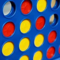 Puzzle game (Connect 4) with red and yellow counters