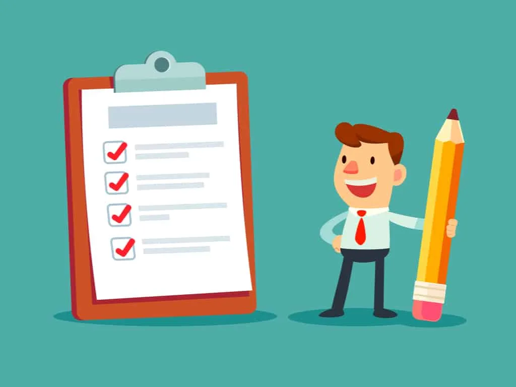 person holding a pencil looking at completed checklist on clipboard