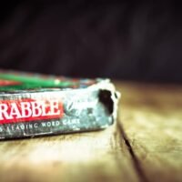 Scrabble Board Game | Old Scrabble Box on Vintage Wooden Table