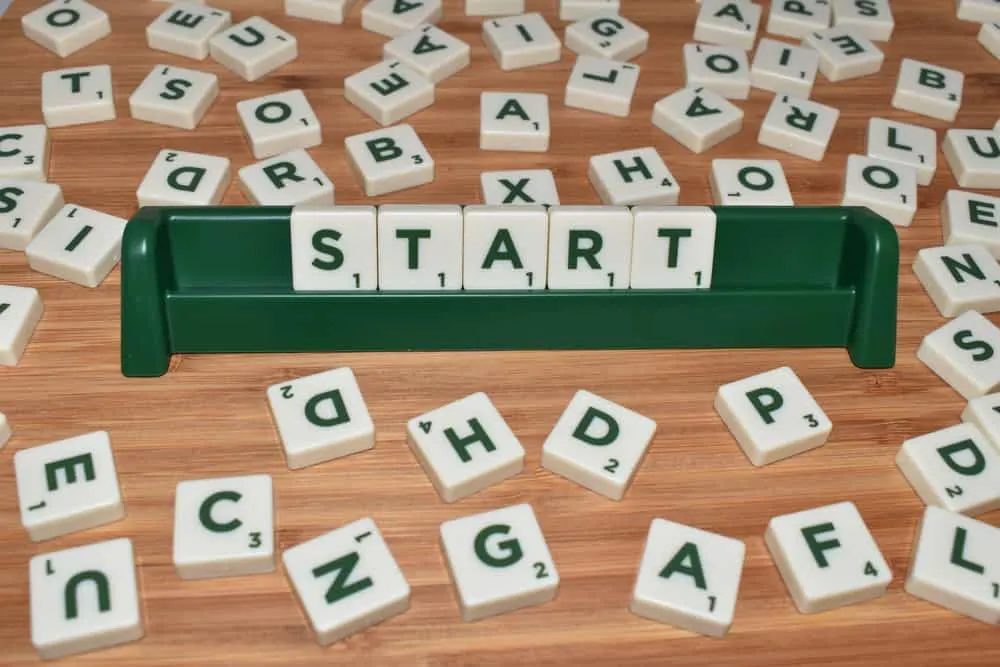 Scrabble - Start word made up of letter tiles surrounded by letters
