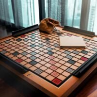 Scrabble board game (competition) with scrabble bag and instruction book