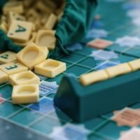 Scrabble board game with letters