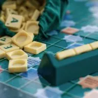 Scrabble board game with letters
