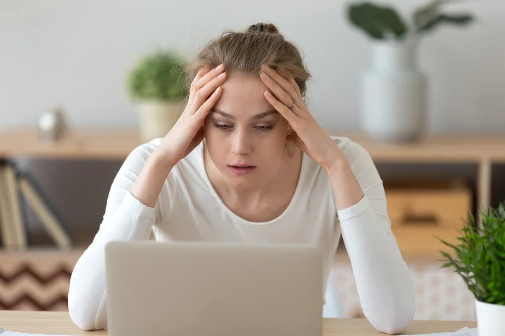 Stressed frustrated young woman