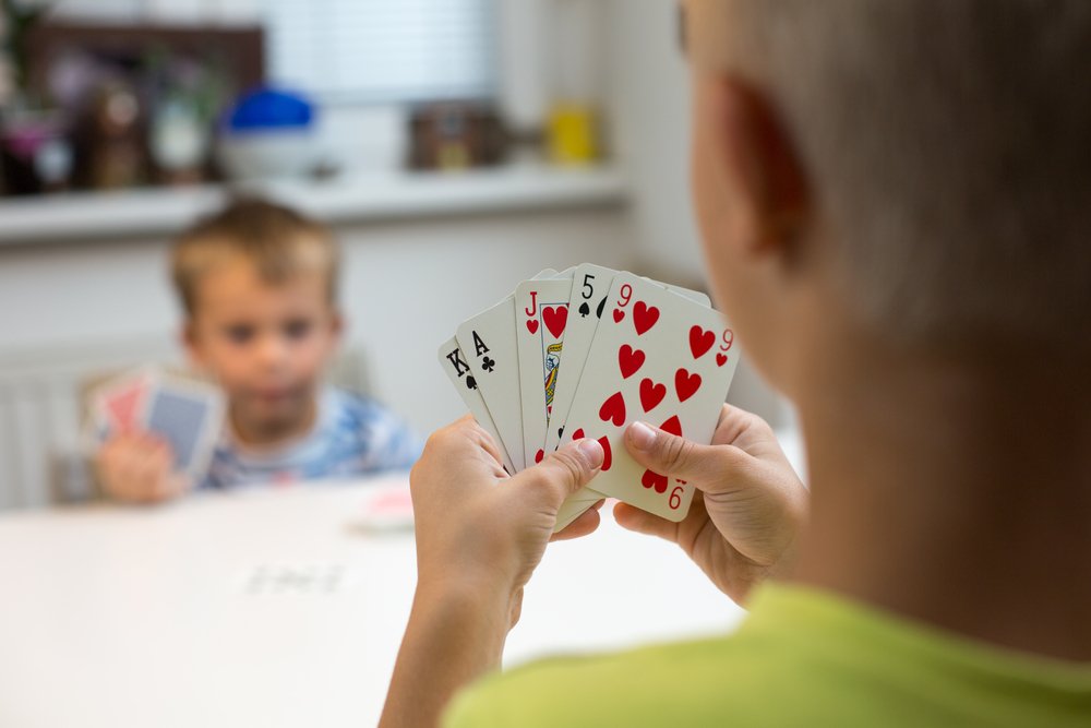 Brothers playing Card Game
