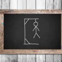 Hangman drawing on chalkboard