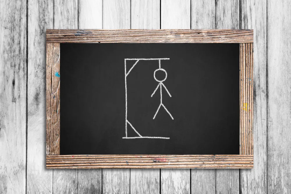 Hangman drawing on chalkboard