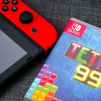 Tetris 99 video game box and Nintendo Switch