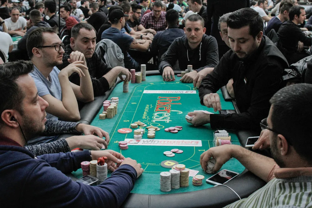 playing poker with chips and cards in a poker festival