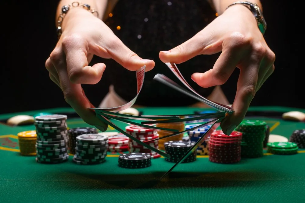 shuffles poker cards in a casino