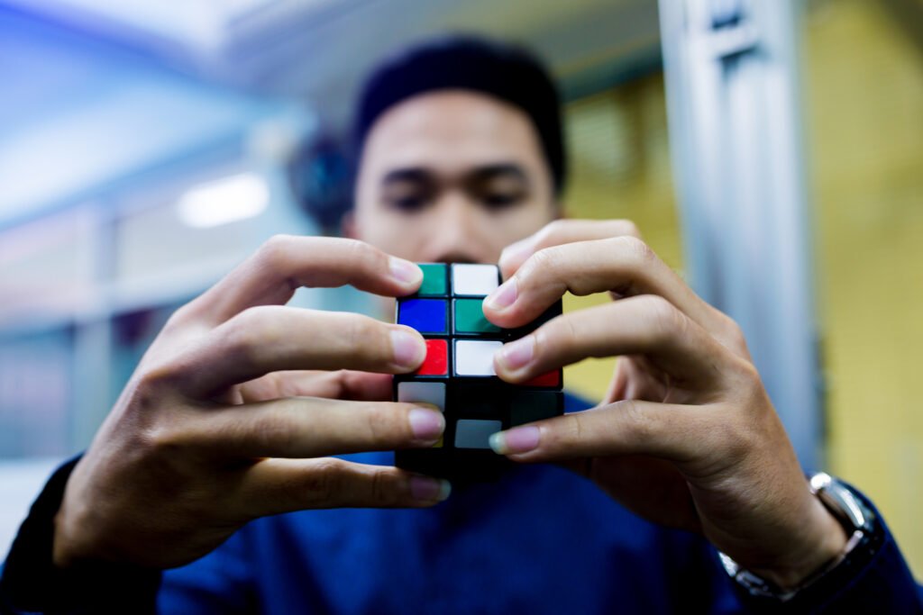 Man holding Rubik's cube