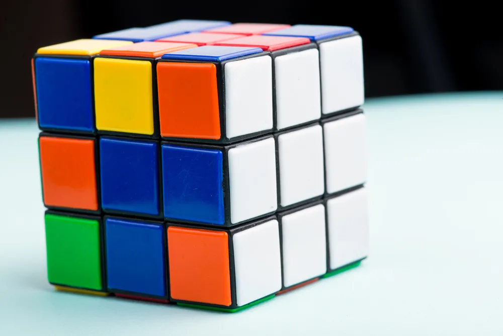 Rubik's cube on the light blue background