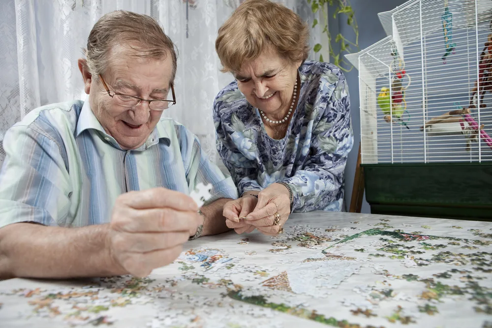 Senior couple working on a puzzle