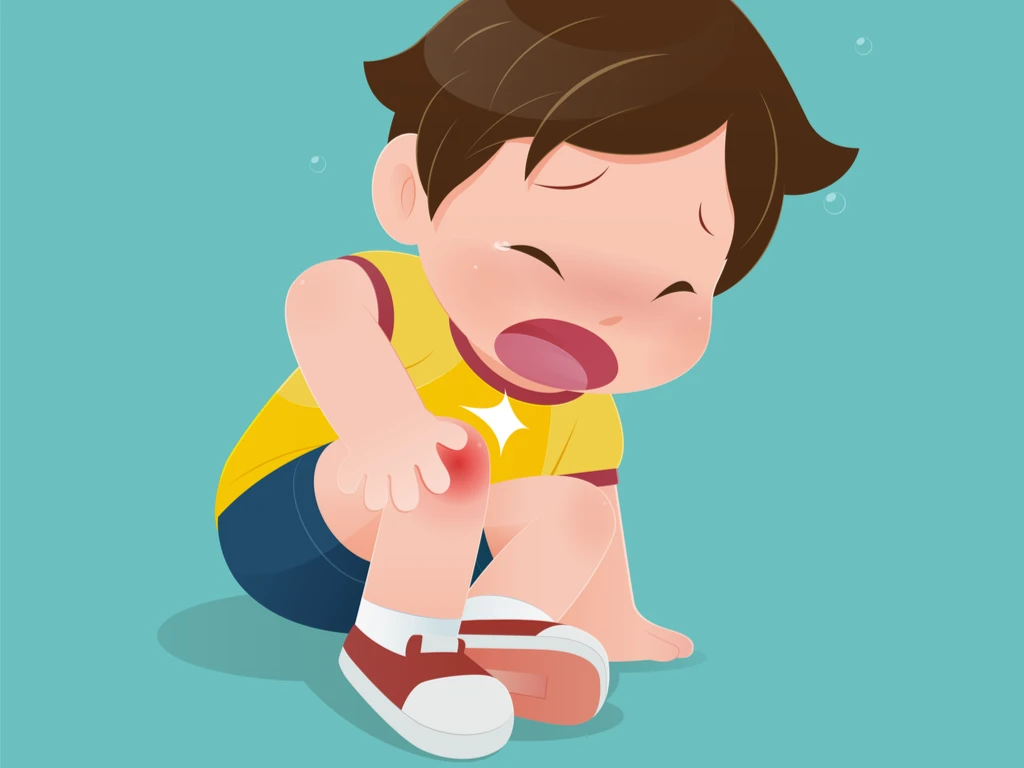 kid having bruises on his knee
