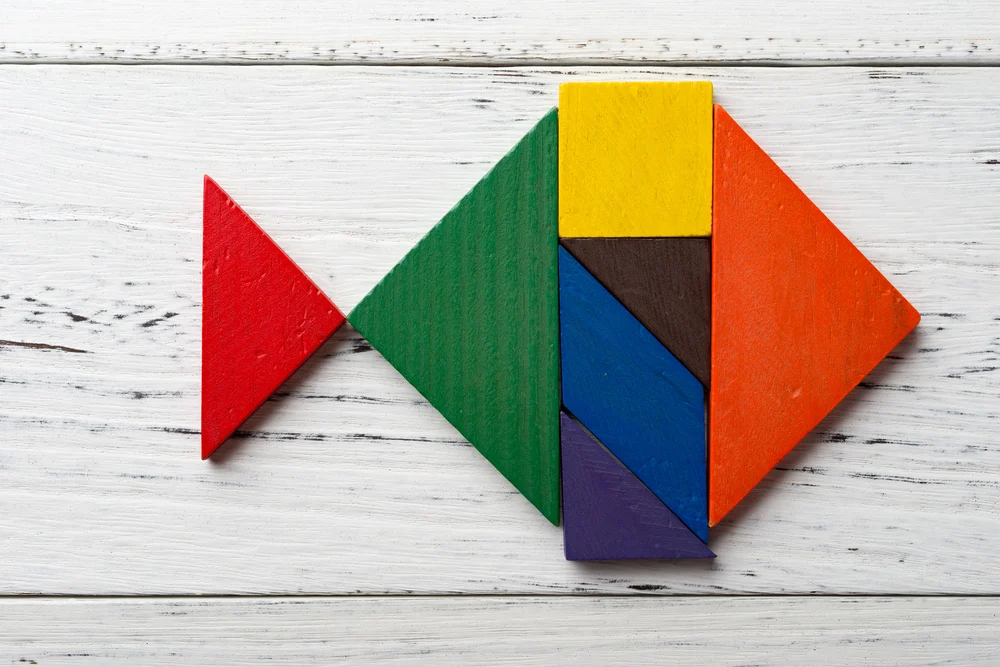 wooden tangram in a fish shape